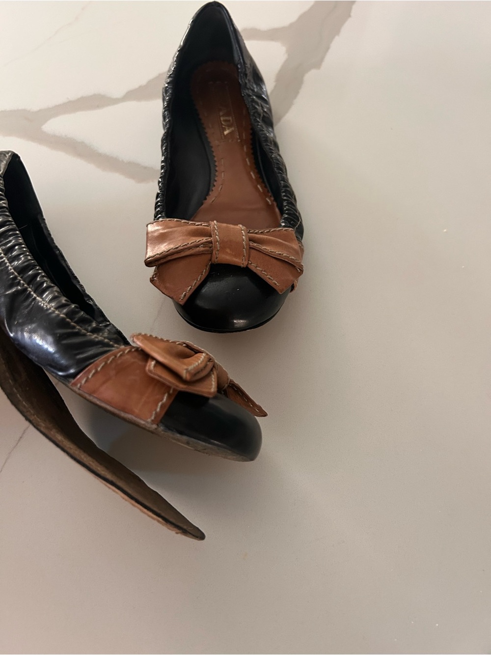 Prada Black Leather Ballet Flats with Tan Bow Accent - Picture 2 of 3